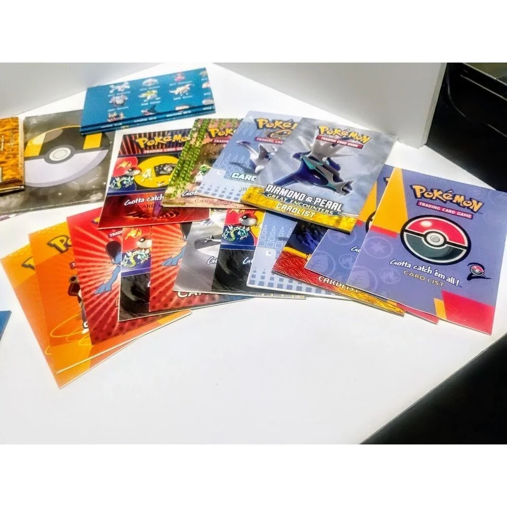 MASSIVE GAME FREAK POKEMON TCG CARD LIST RULEBOOK & PLAYMAT LOT W MORE